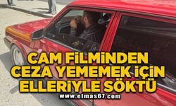 Cam filminden ceza yememek için elleriyle söktü