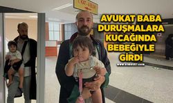 Avukat baba duruşmalara kucağında bebeğiyle girdi