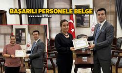 Hazina arazisi işlemlerinde özverili çalışan personele başarı belgesi