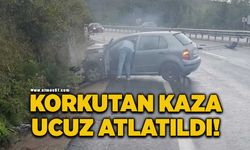 Otomobil kayganlaşan yolda duvara çarparak durabildi