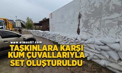 Taşkınlara karşı kum çuvallarıyla set oluşturuldu