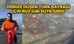 Denize düşen Türk bayrağı için buz gibi suya girdi