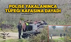 Polise yakalanınca tüfeği kafasına dayadı