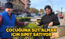 Çocuğuna süt almak için simit satıyor