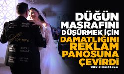 Düğün masrafını düşürmek için damatlığını reklam panosuna çevirdi