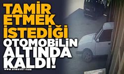 Tamir etmek istediği otomobilin altında kaldı