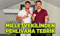 Milletvekili Ertuğrul’dan başarılı pehlivana kutlama