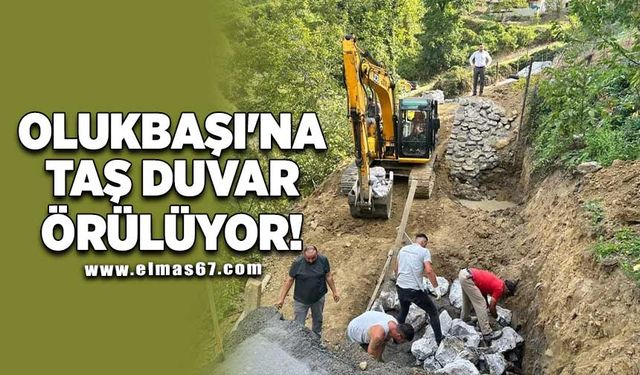 OLUKBAŞI'NA TAŞ DUVAR ÖRÜLÜYOR!