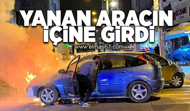 Yanan aracın içine girdi!