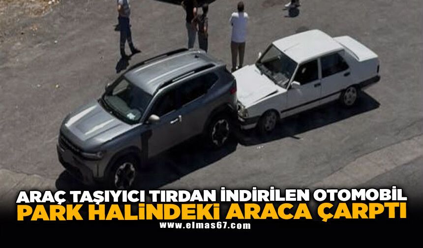 Araç taşıyıcı tırdan indirilen otomobil park halindeki araca çarptı